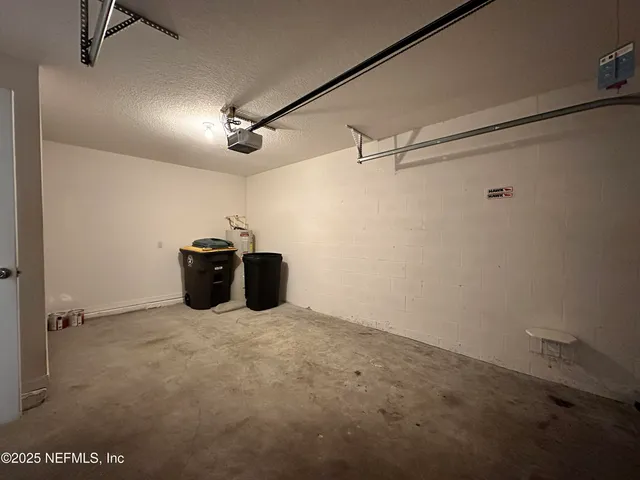 a view of backyard with tree