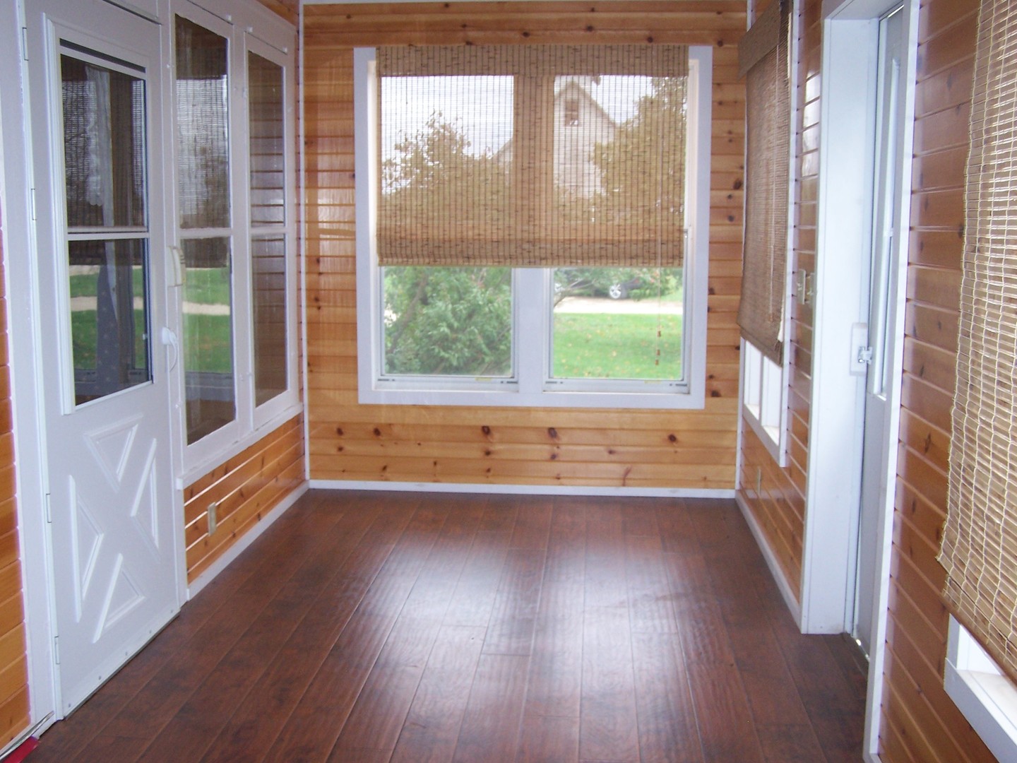 4045 East 22nd Road Serena, IL 60549 - Photo 19 of 31 a view of an empty room with wooden floor and a window