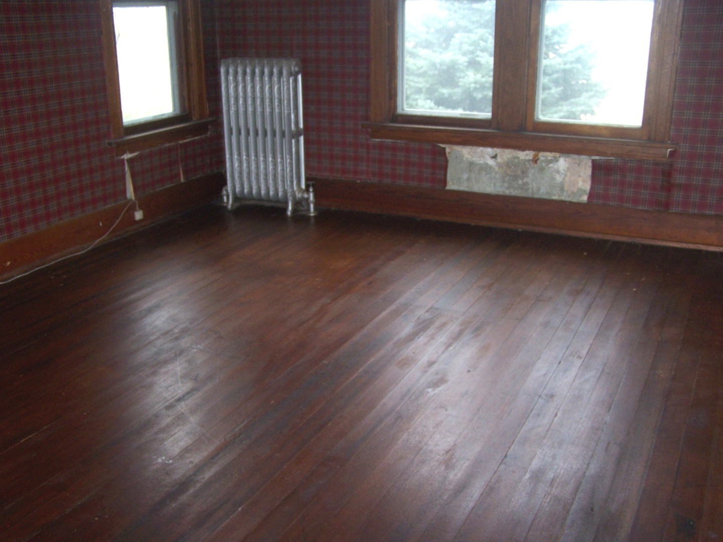 4045 East 22nd Road Serena, IL 60549 - Photo 23 of 31 an empty room with wooden floor and windows