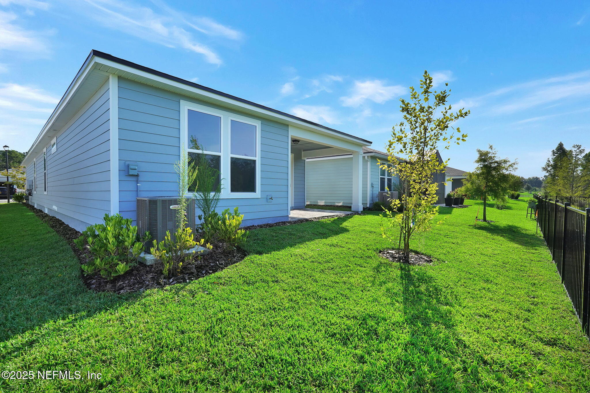 239 Fairlake Circle St. Augustine, FL 32092 - Photo 29 of 30 a house view with a garden space