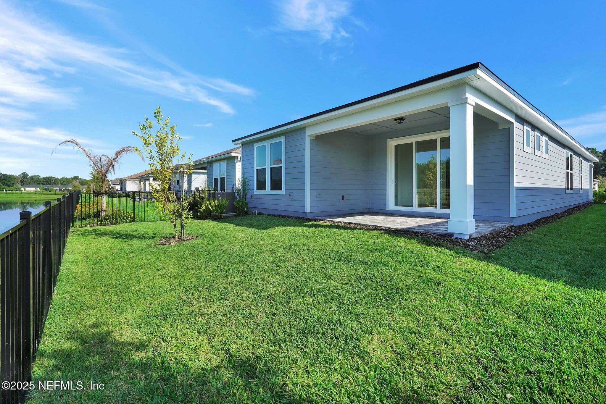 239 Fairlake Circle St. Augustine, FL 32092 - Photo 30 of 30 a front view of house with yard and green space