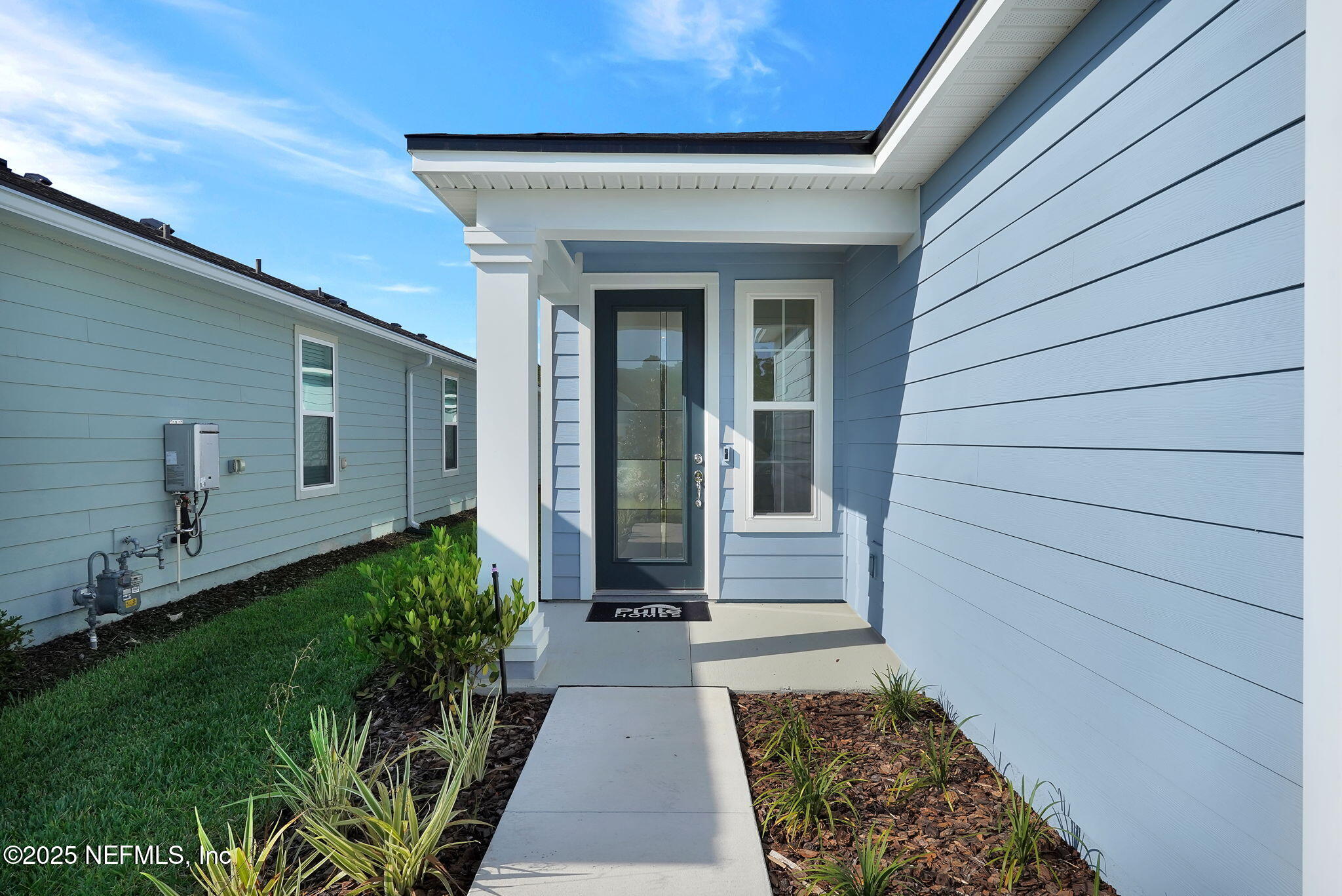 239 Fairlake Circle St. Augustine, FL 32092 - Photo 5 of 30 a view of a pathway with a house