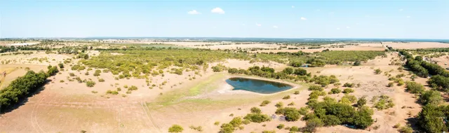 a view of beach and swimming pool