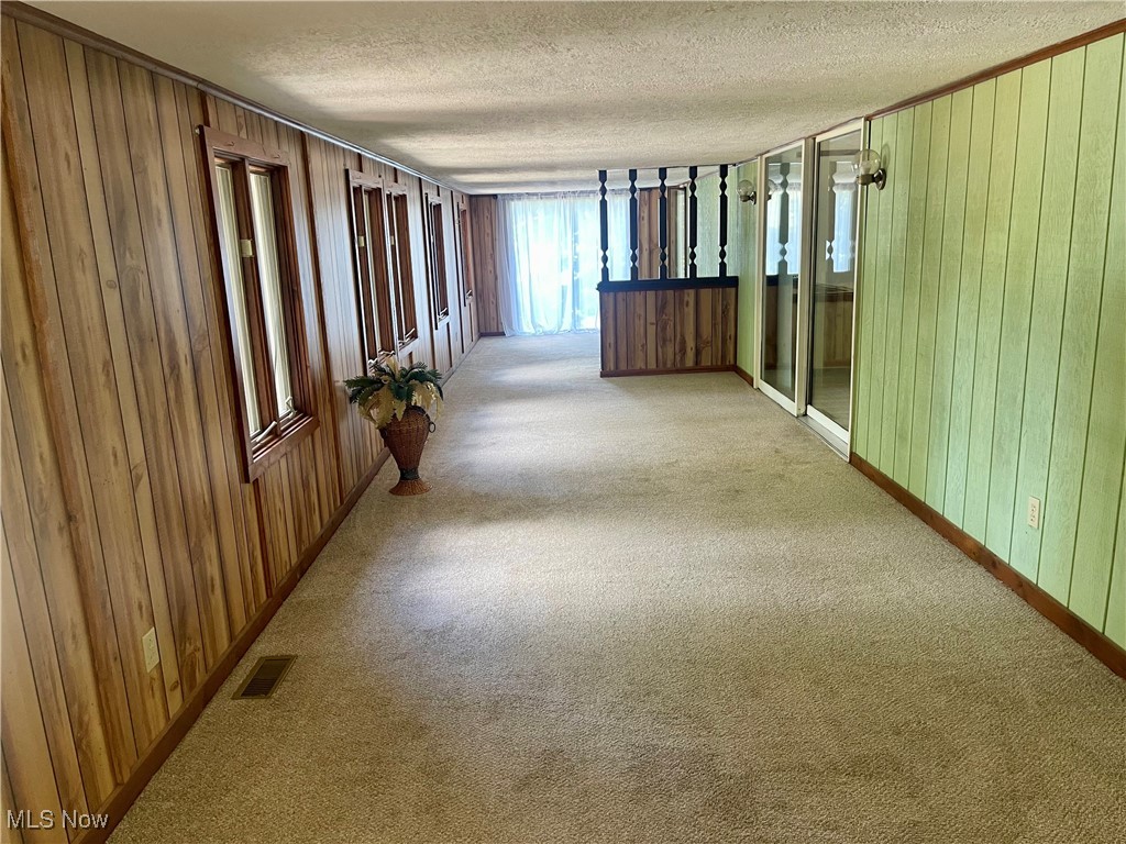 6518 Stonecreek Road Southwest Newcomerstown, OH 43832 - Photo 13 of 42 Sun room that is heated and cooled on the 1st floor.