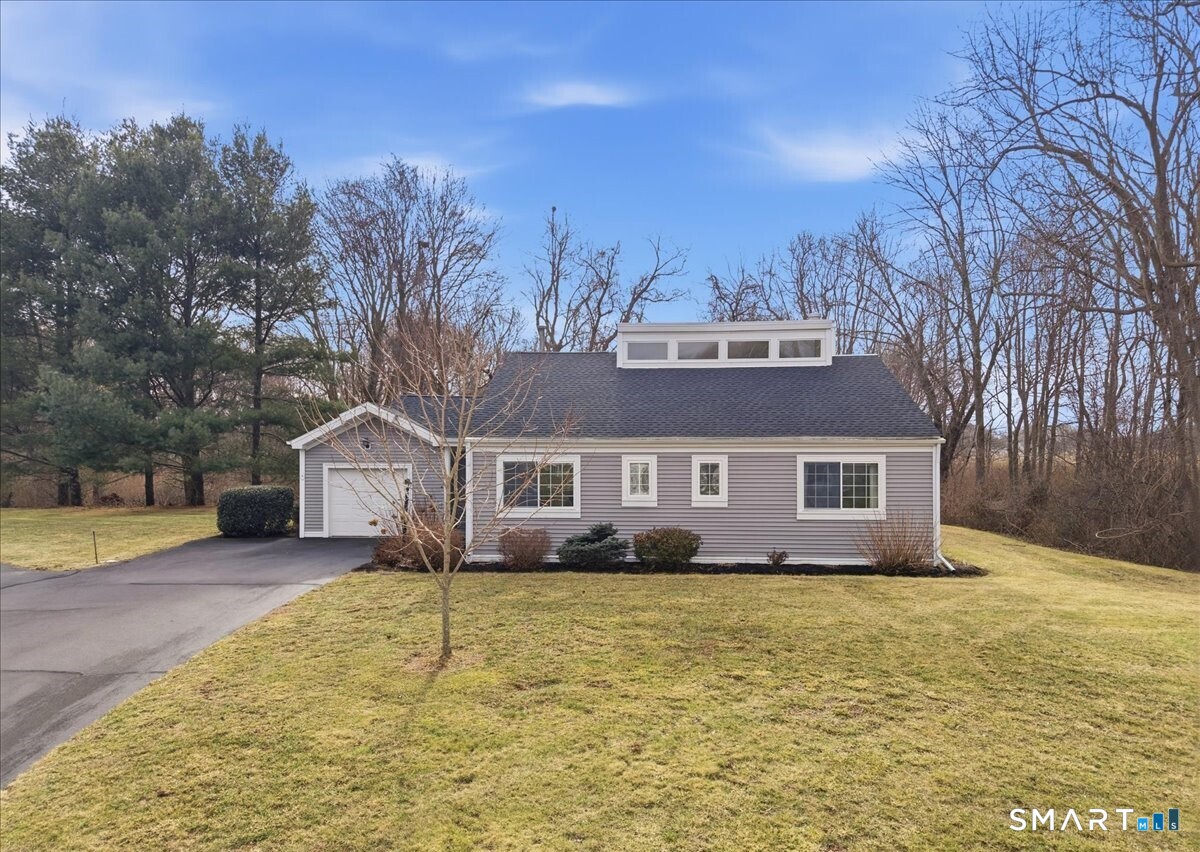 front view of house with a yard