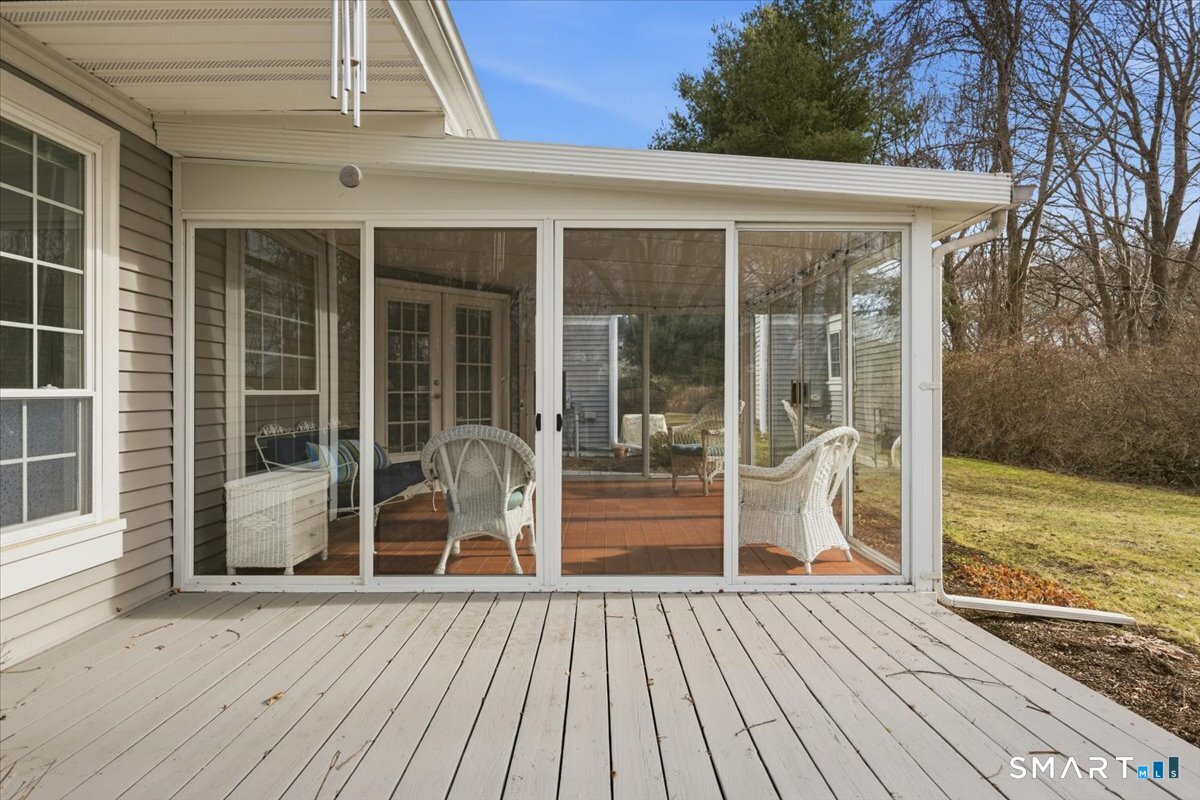 367 Main Street, Unit 7 Old Saybrook, CT 06475 - Photo 11 of 27 a front view of a house with a patio