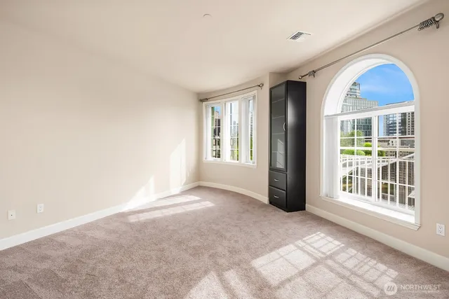 an empty room with windows