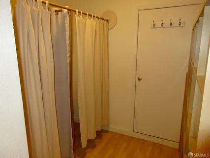 a bathroom with a sink mirror and vanity