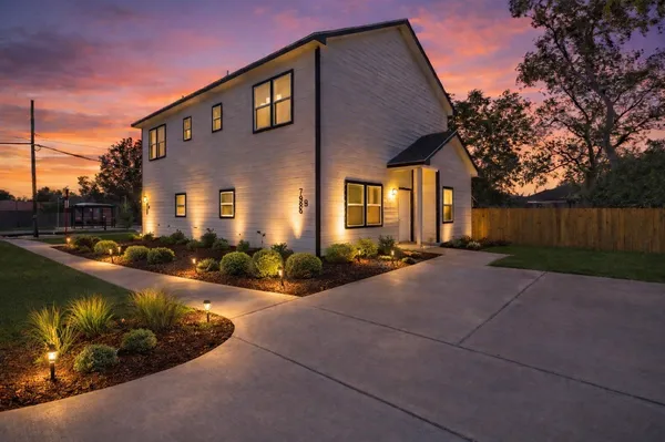 a house view with a outdoor space