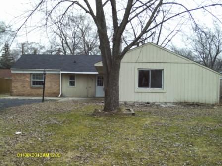 132 Kingston Road Bolingbrook, IL 60440 - Photo 1 of 9 a house with trees in front of it