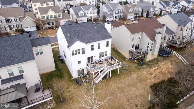 an aerial view of a building with outdoor space