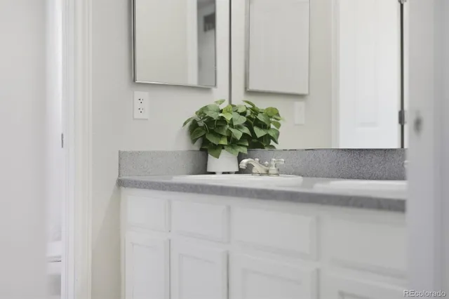 a close view of sink and cabinets