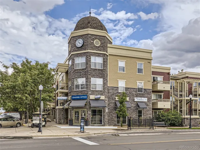a view of a building with a street