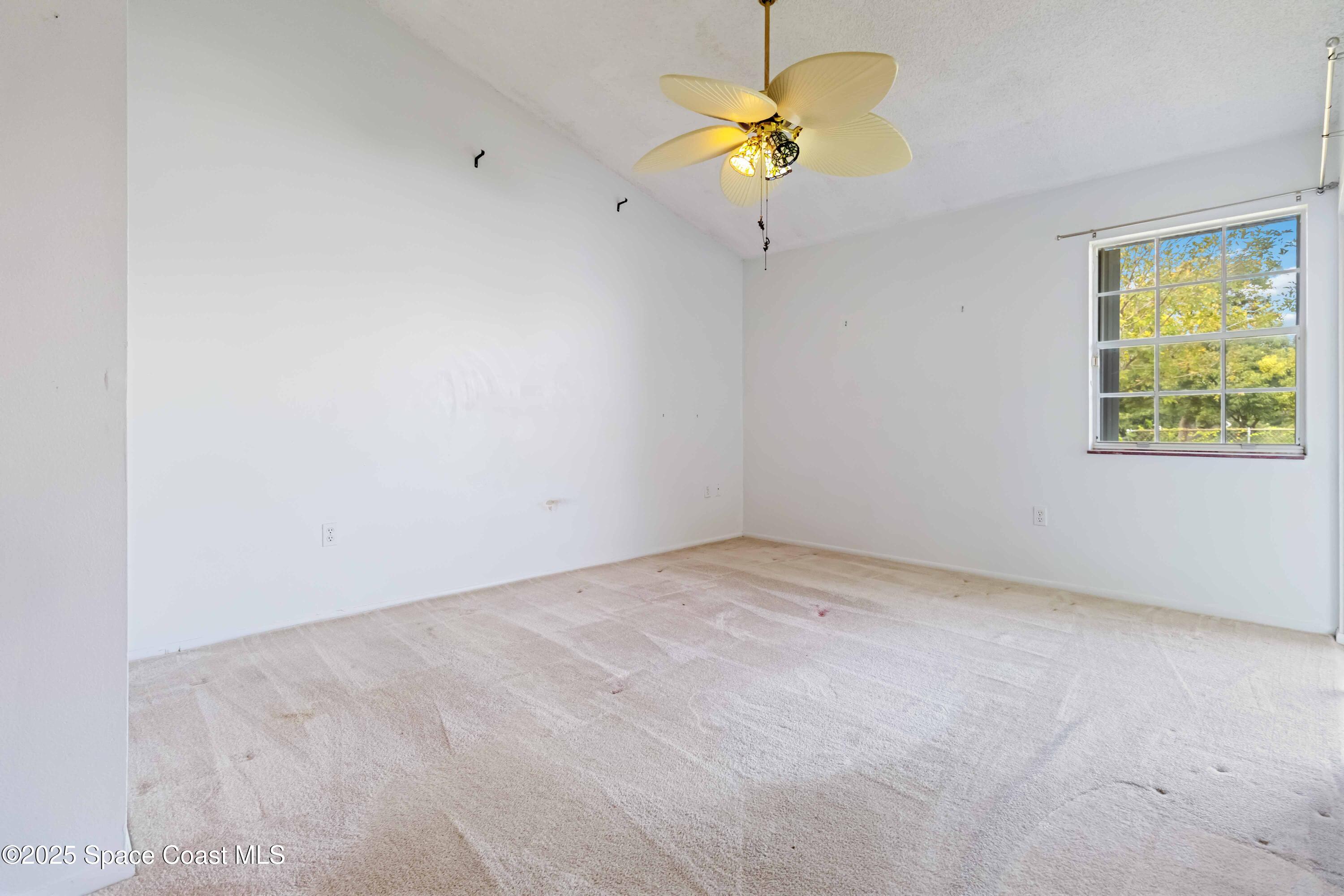 3728 West Malory Court Cocoa, FL 32926 - Photo 23 of 37 an empty room with a window
