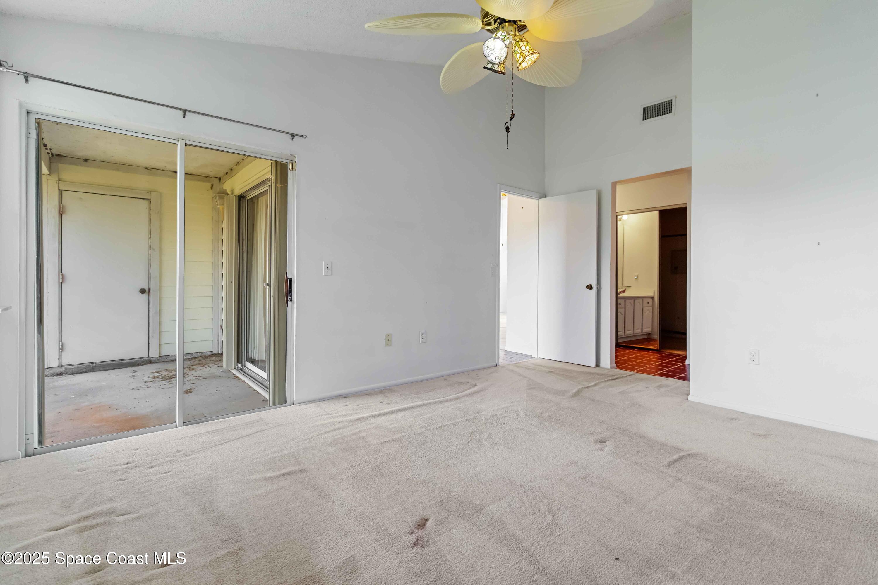 3728 West Malory Court Cocoa, FL 32926 - Photo 25 of 37 a view of an empty room with a bathroom