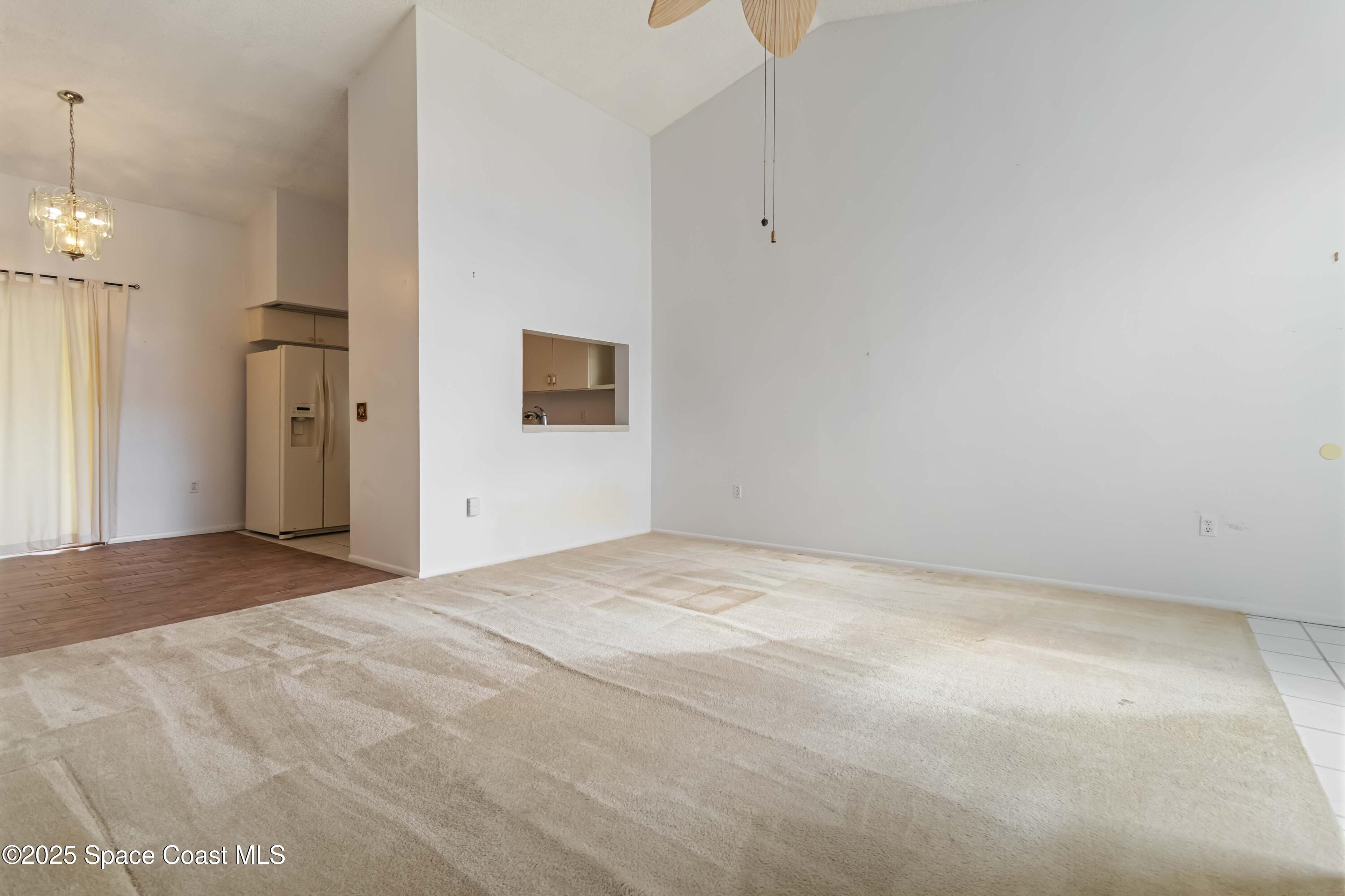 3728 West Malory Court Cocoa, FL 32926 - Photo 5 of 37 a view of empty room with a fireplace