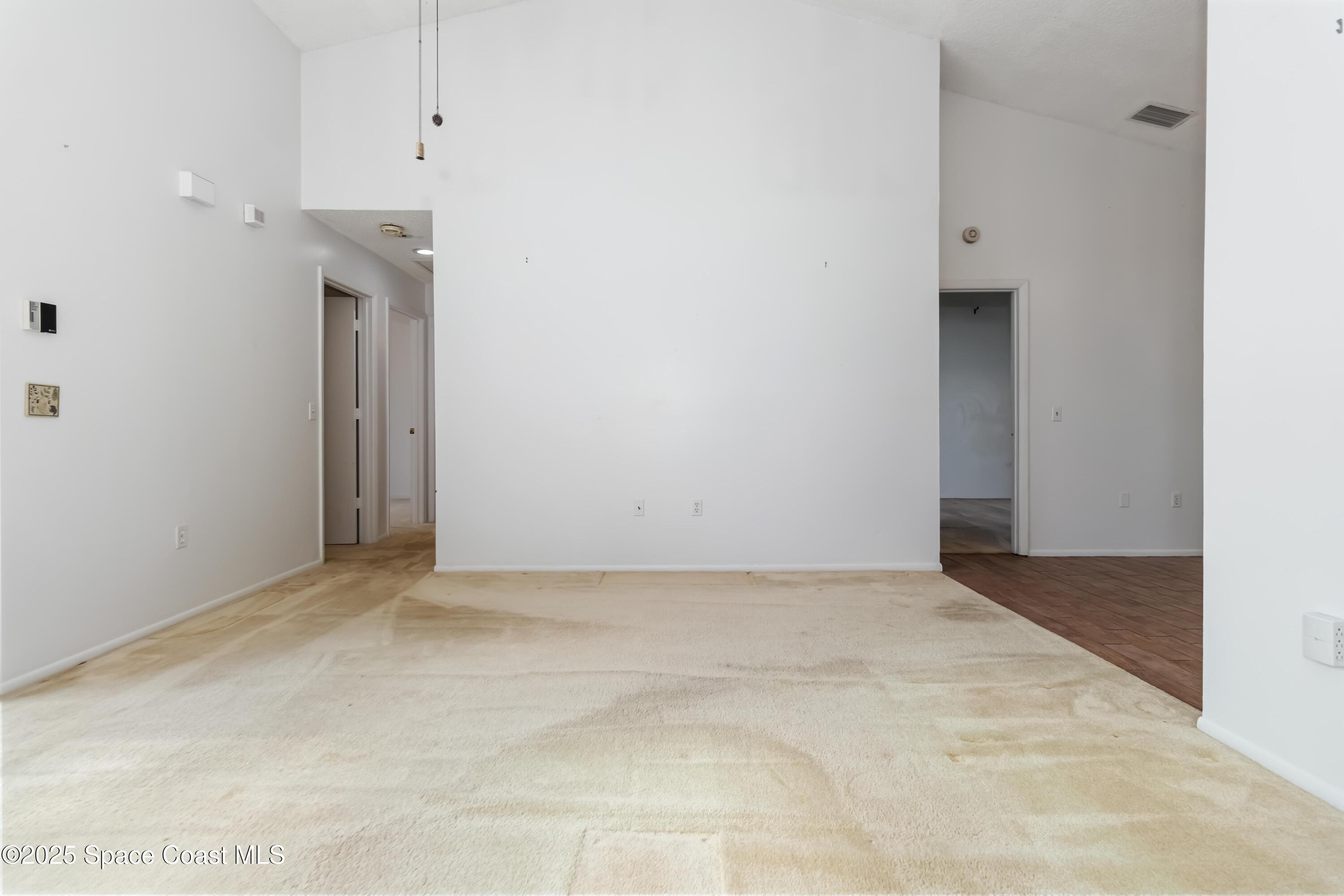 3728 West Malory Court Cocoa, FL 32926 - Photo 9 of 37 a view of an empty room