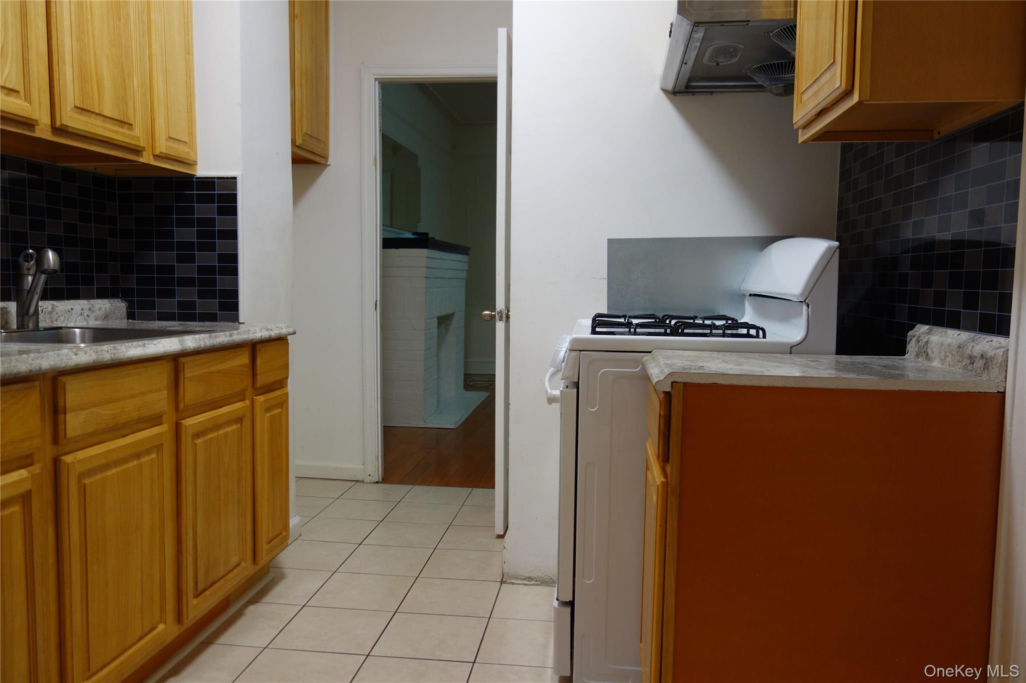 160-11 84th Road Queens, NY 11432 - Photo 18 of 25 1st Floor Kitchen