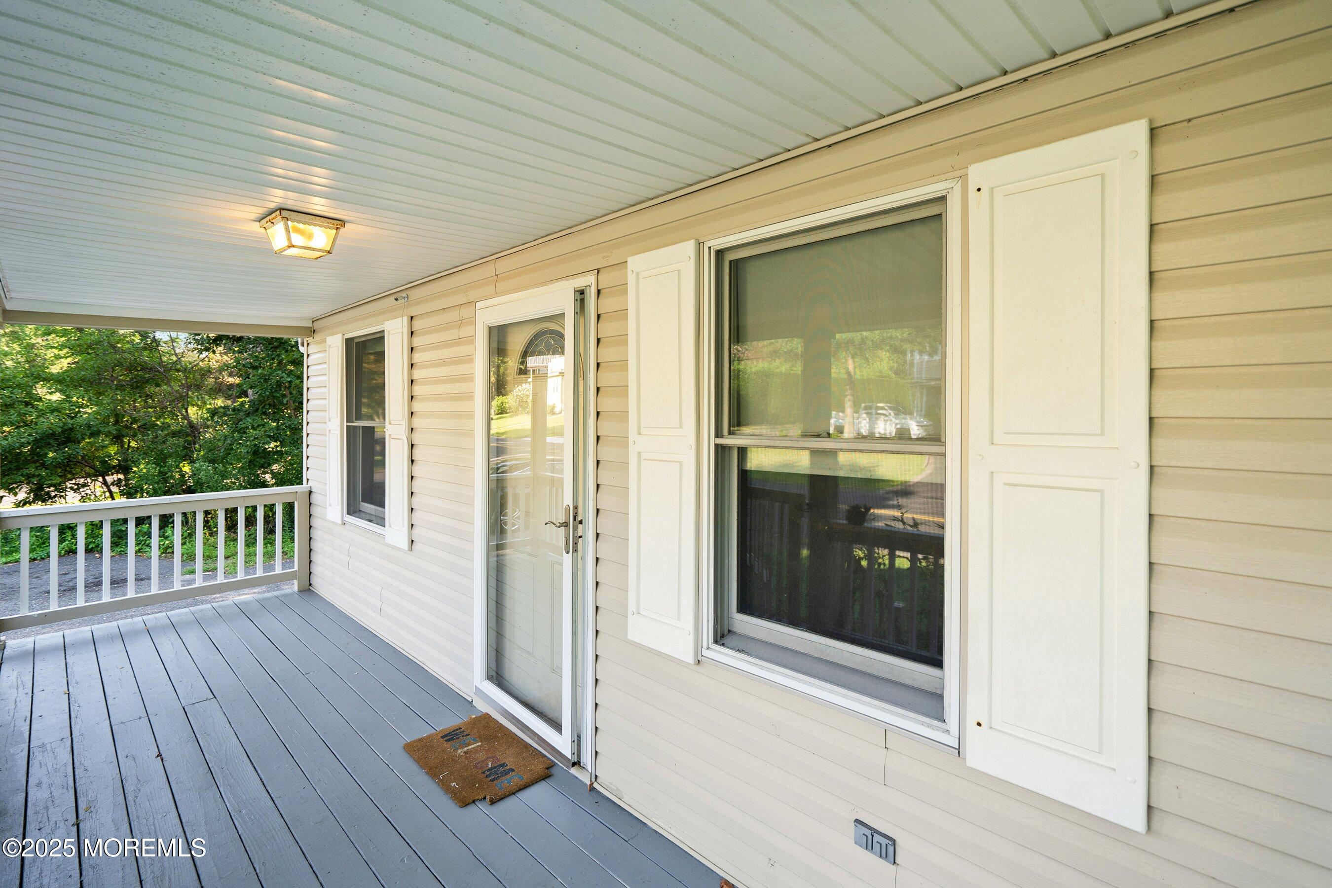 2148 Allenwood Road Wall, NJ 07719 - Photo 12 of 27 a view of a balcony with wooden floor