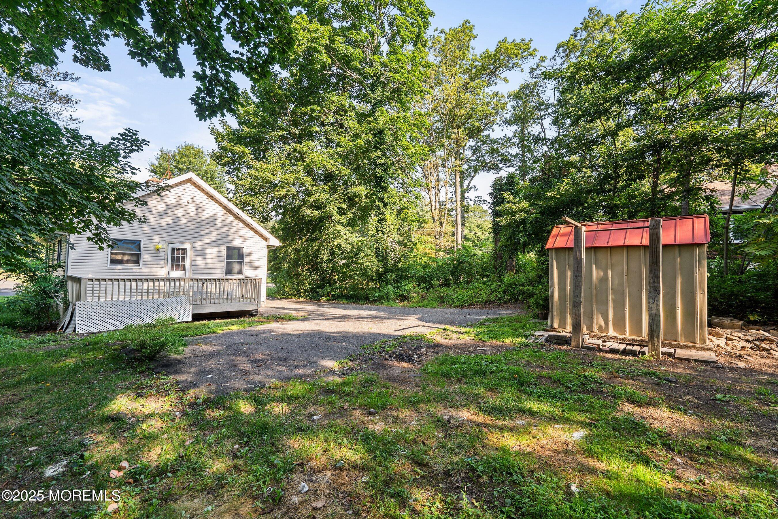 2148 Allenwood Road Wall, NJ 07719 - Photo 21 of 27 a house view with a outdoor space