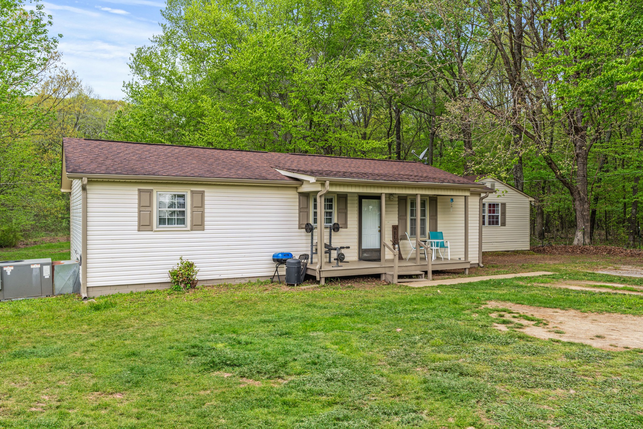 31303 Ardmore Ridge Road Ardmore, TN 38449 - Photo 3 of 27 a view of a house with a yard and sitting area