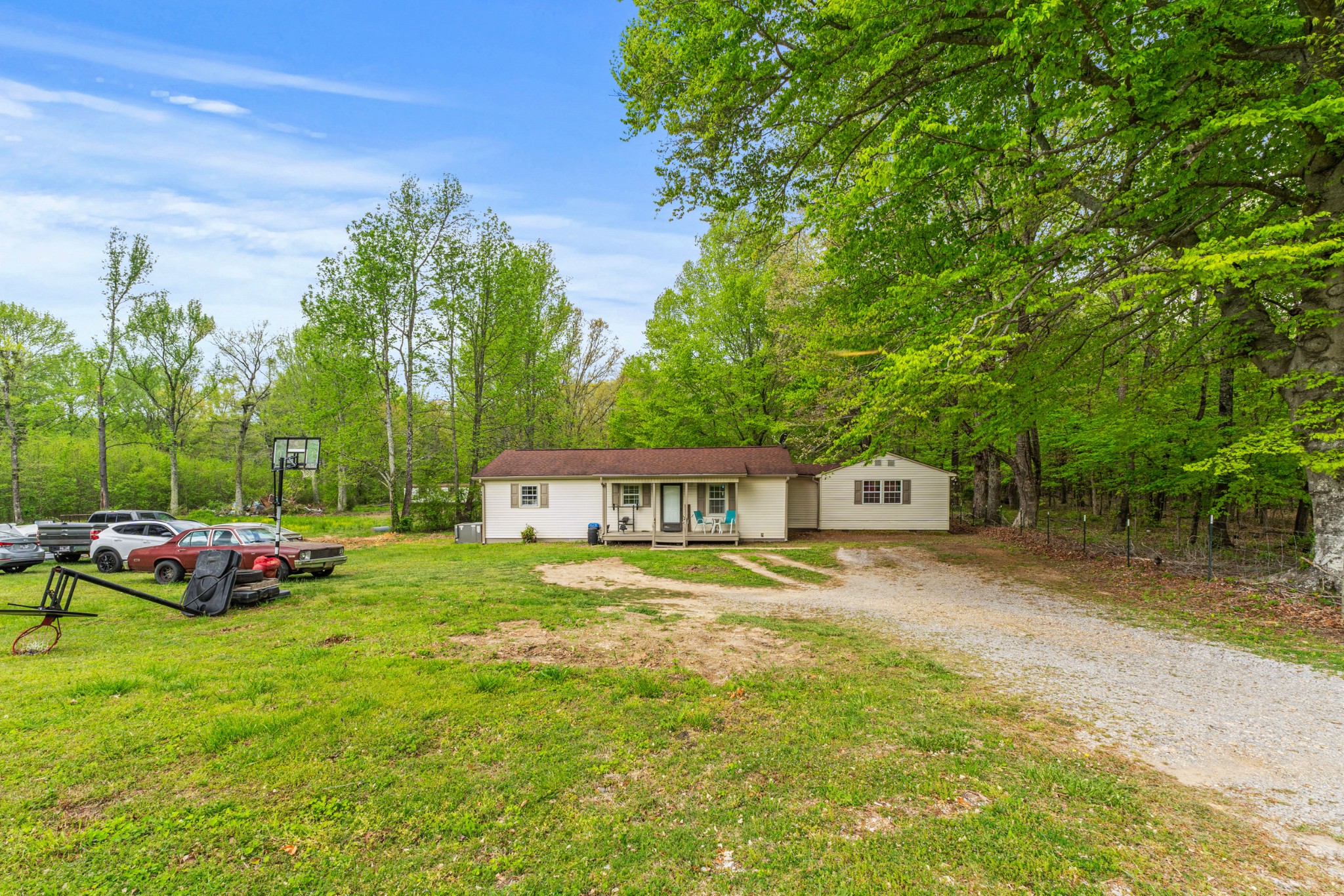31303 Ardmore Ridge Road Ardmore, TN 38449 - Photo 8 of 27 a front view of a house with garden
