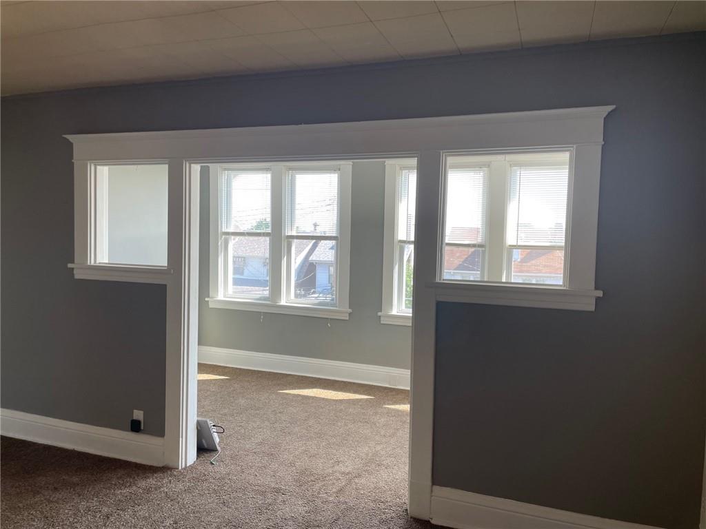 732 Bay Ridge Avenue, Unit 2 Brookline, PA 15226 - Photo 4 of 9 an empty room with windows