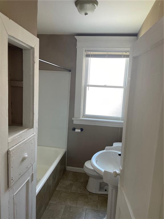 732 Bay Ridge Avenue, Unit 2 Brookline, PA 15226 - Photo 6 of 9 a bathroom with a sink a toilet and shower