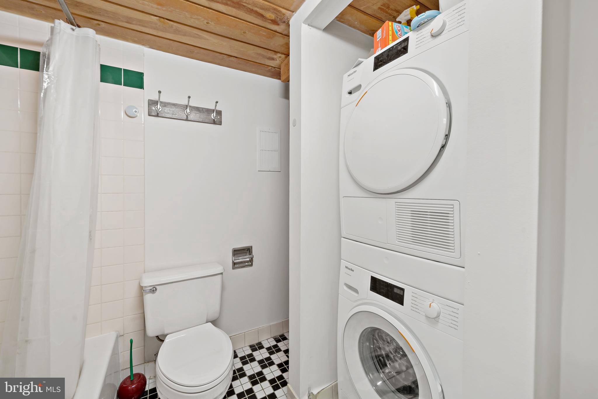1010 Race Street, Unit PG Philadelphia, PA 19107 - Photo 11 of 14 a bathroom with a toilet and a sink