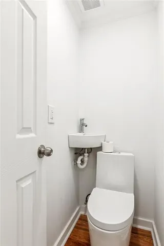 a view of kitchen with wooden floor