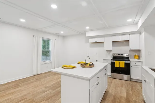 a bathroom with a shower and a sink