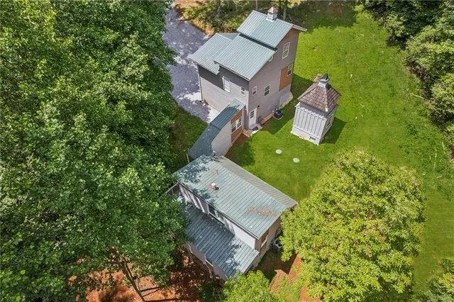 a backyard of a house with lots of green space