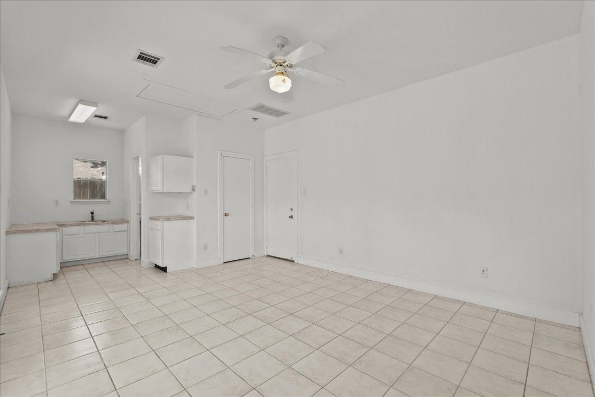 5762 Birdwood Road Houston, TX 77096 - Photo 40 of 50 THIS IS THE STUDIO-STYLED ADU. PERFECT FOR A GAME ROOM, HOME OFFICE, WORKSHOP, CRAFT ROOM, ETC. OR USE AS A LONG TERM RENTAL.