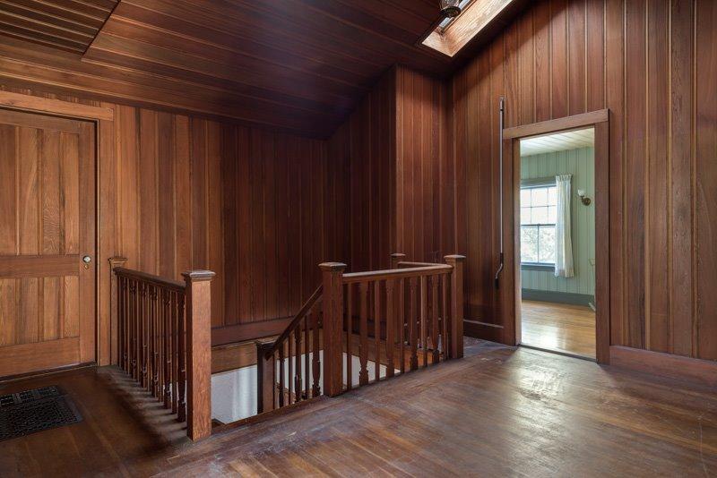 101 Associates Road Falmouth, MA 02540 - Photo 15 of 31 a view of a hallway with wooden floor