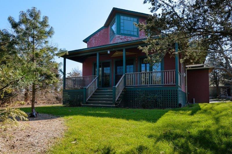 101 Associates Road Falmouth, MA 02540 - Photo 22 of 31 a front view of a house with a yard
