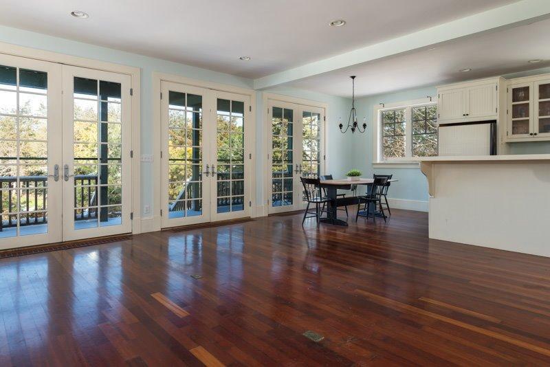 101 Associates Road Falmouth, MA 02540 - Photo 24 of 31 a view of a work space with wooden floor and windows