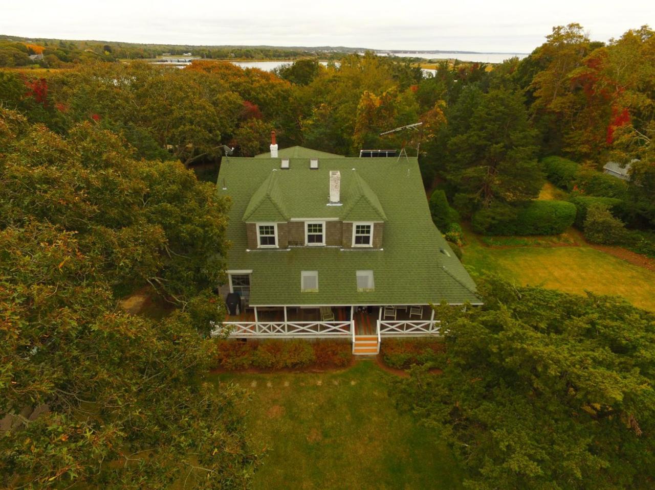 101 Associates Road Falmouth, MA 02540 - Photo 3 of 31 a view of a ocean with a mountain