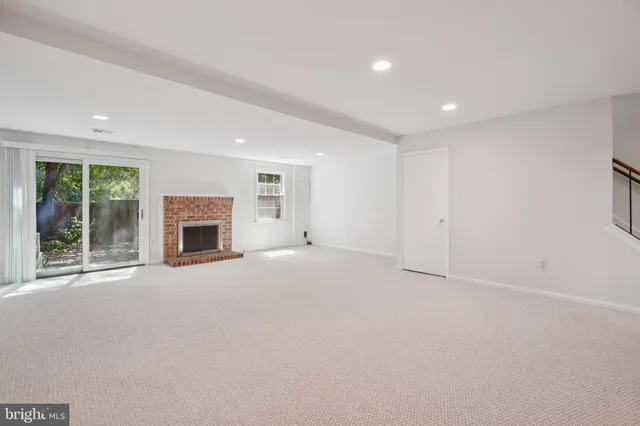 a bathroom with a sink toilet a mirror and bathtub