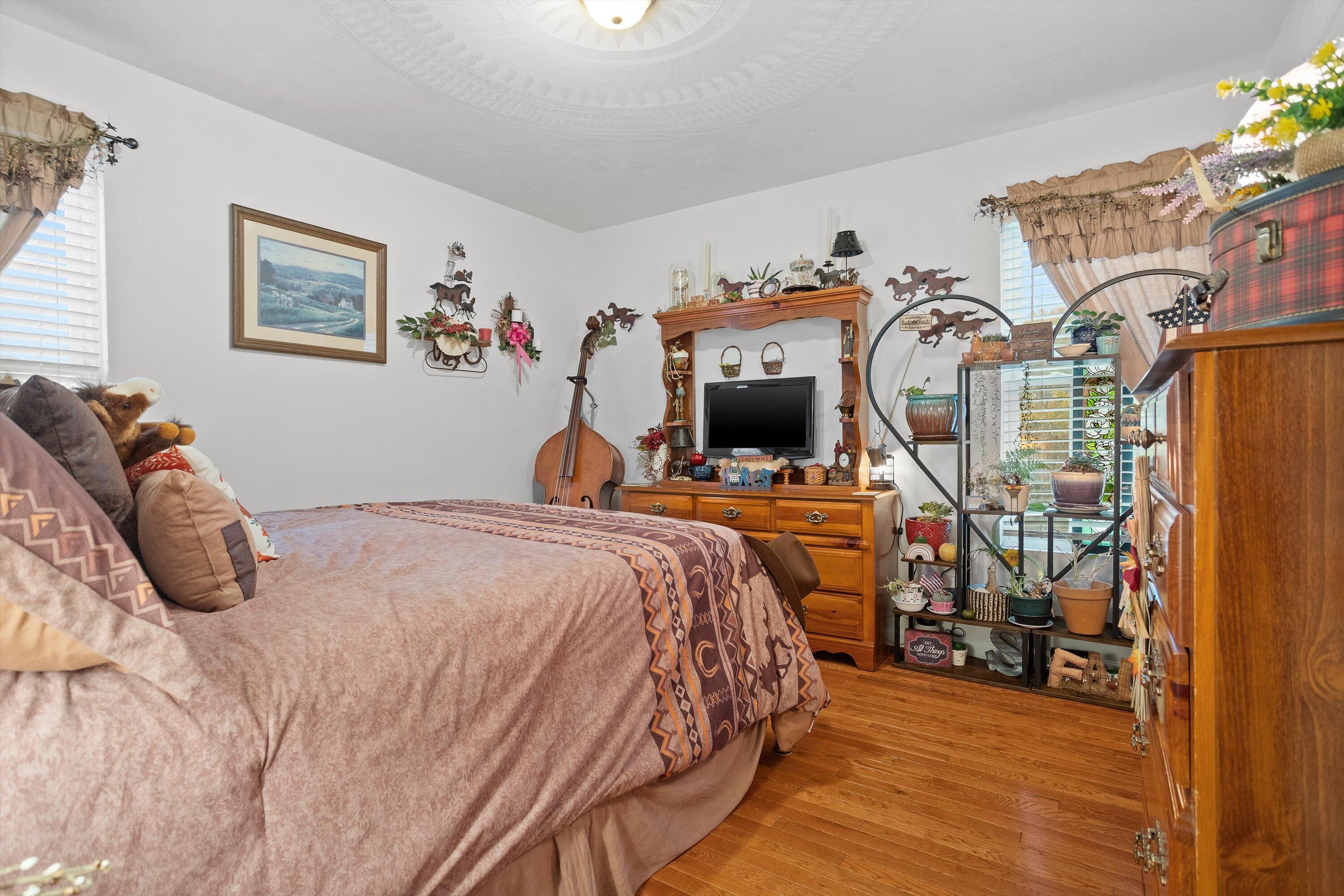 4348 Stewartsville Road Moneta, VA 24121 - Photo 18 of 29 a bedroom with bed and a view of bedroom