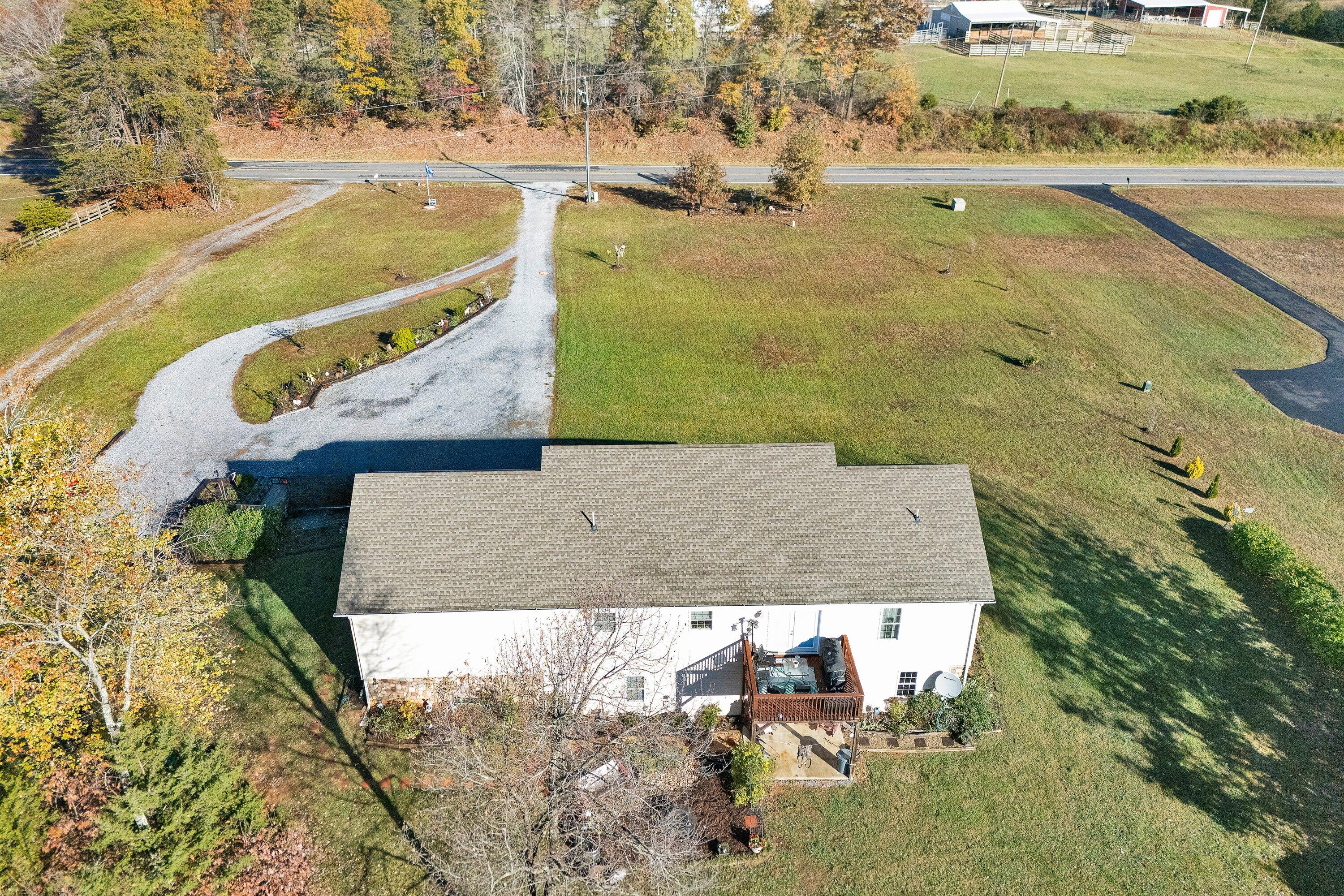 4348 Stewartsville Road Moneta, VA 24121 - Photo 24 of 29 an aerial view of a house with outdoor space