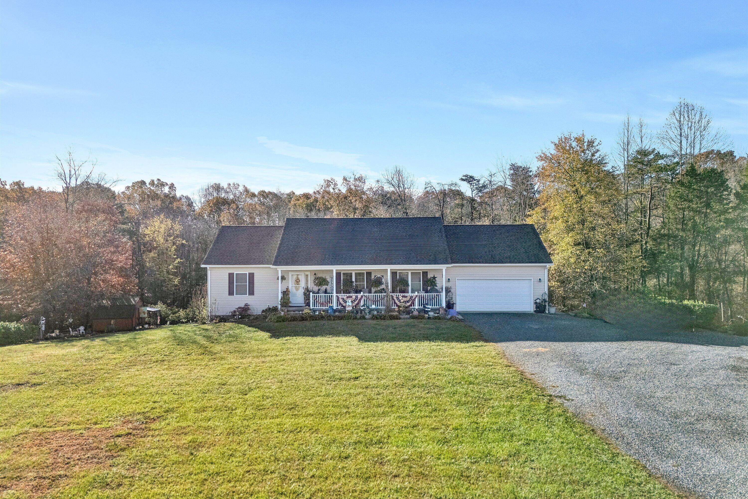 4348 Stewartsville Road Moneta, VA 24121 - Photo 25 of 29 a view of a house with a yard and lake view