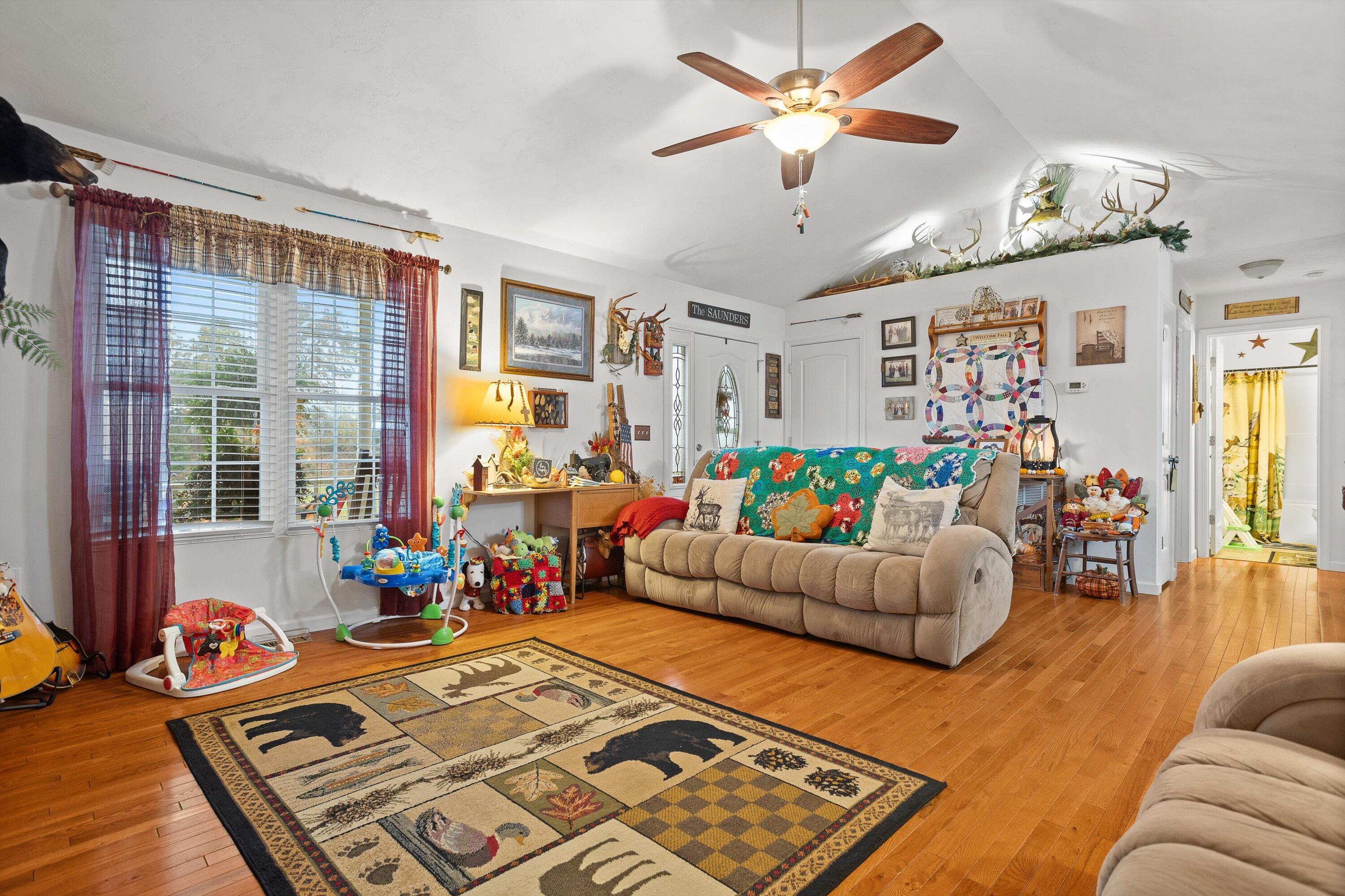 4348 Stewartsville Road Moneta, VA 24121 - Photo 4 of 29 a living room with patio furniture and a large window