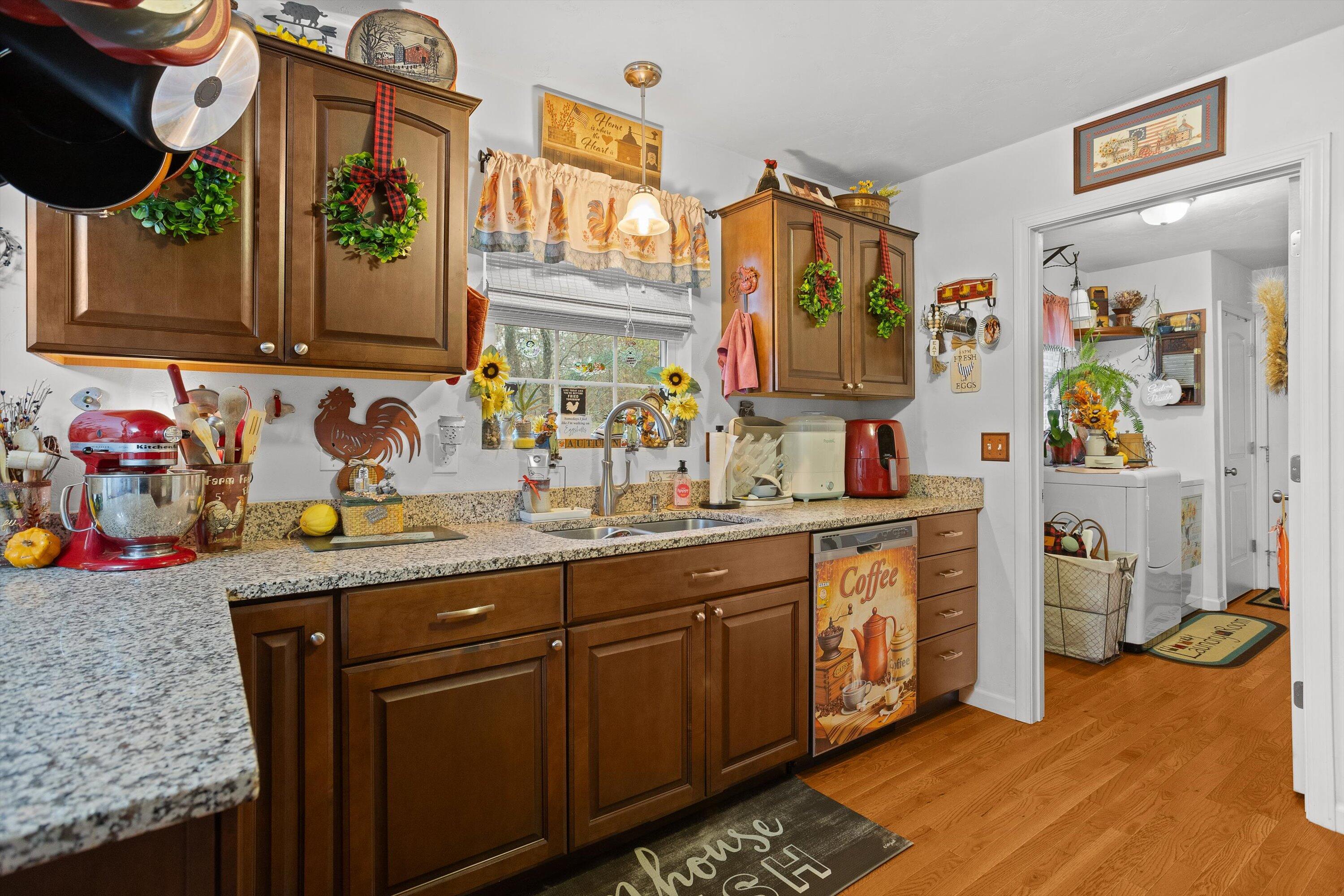 4348 Stewartsville Road Moneta, VA 24121 - Photo 9 of 29 a kitchen with stainless steel appliances granite countertop a sink and cabinets