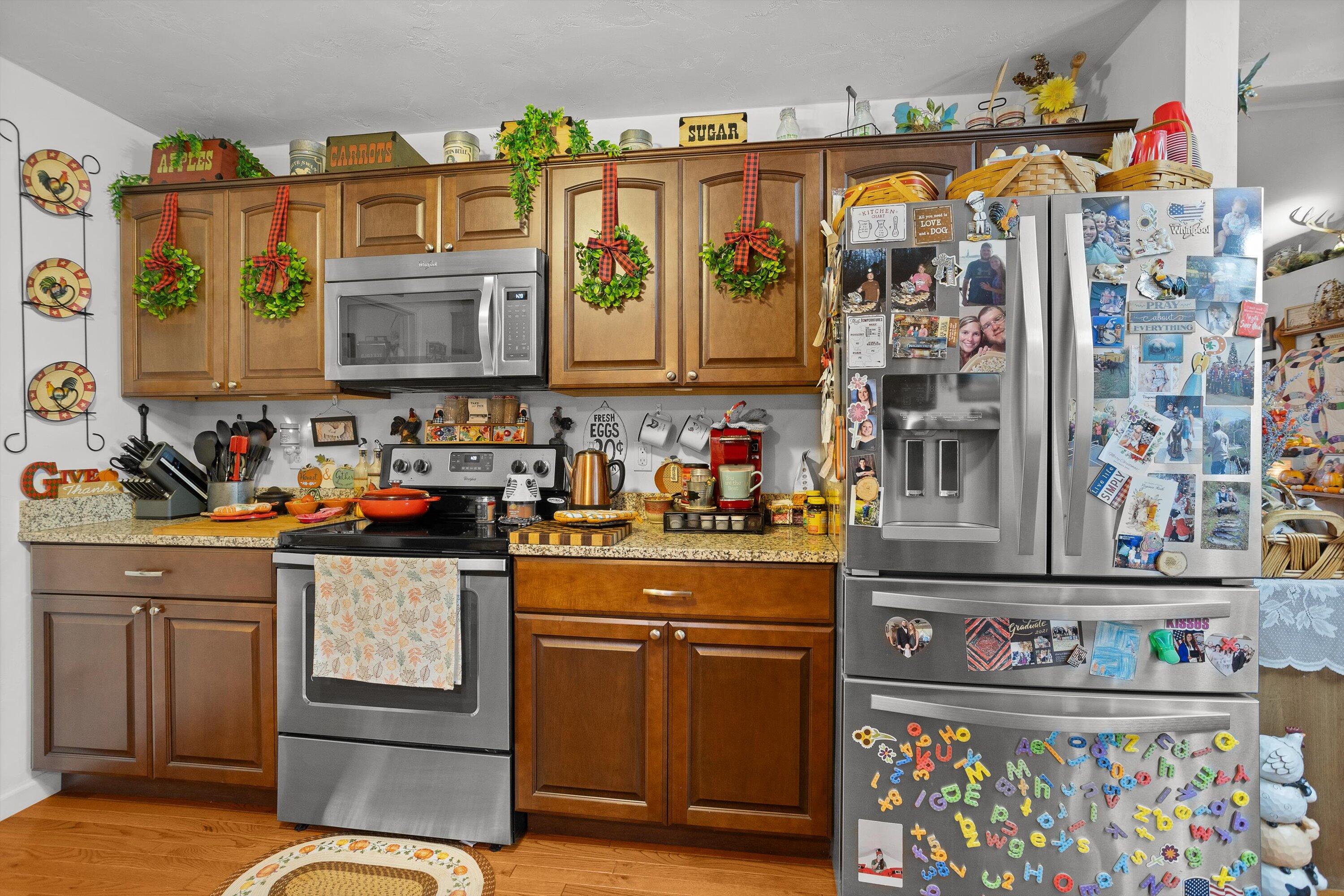 4348 Stewartsville Road Moneta, VA 24121 - Photo 10 of 29 a kitchen with stainless steel appliances granite countertop a sink and a stove