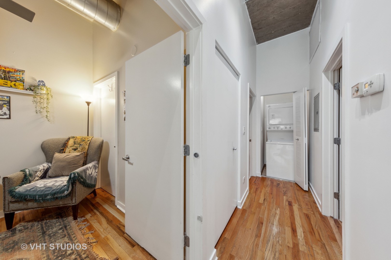 1111 West 15th Street, Unit 115 Chicago, IL 60608 - Photo 13 of 22 a bathroom with a tub and toilet