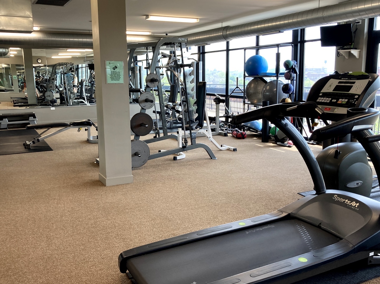 1111 West 15th Street, Unit 115 Chicago, IL 60608 - Photo 19 of 22 a view of a room with gym equipment