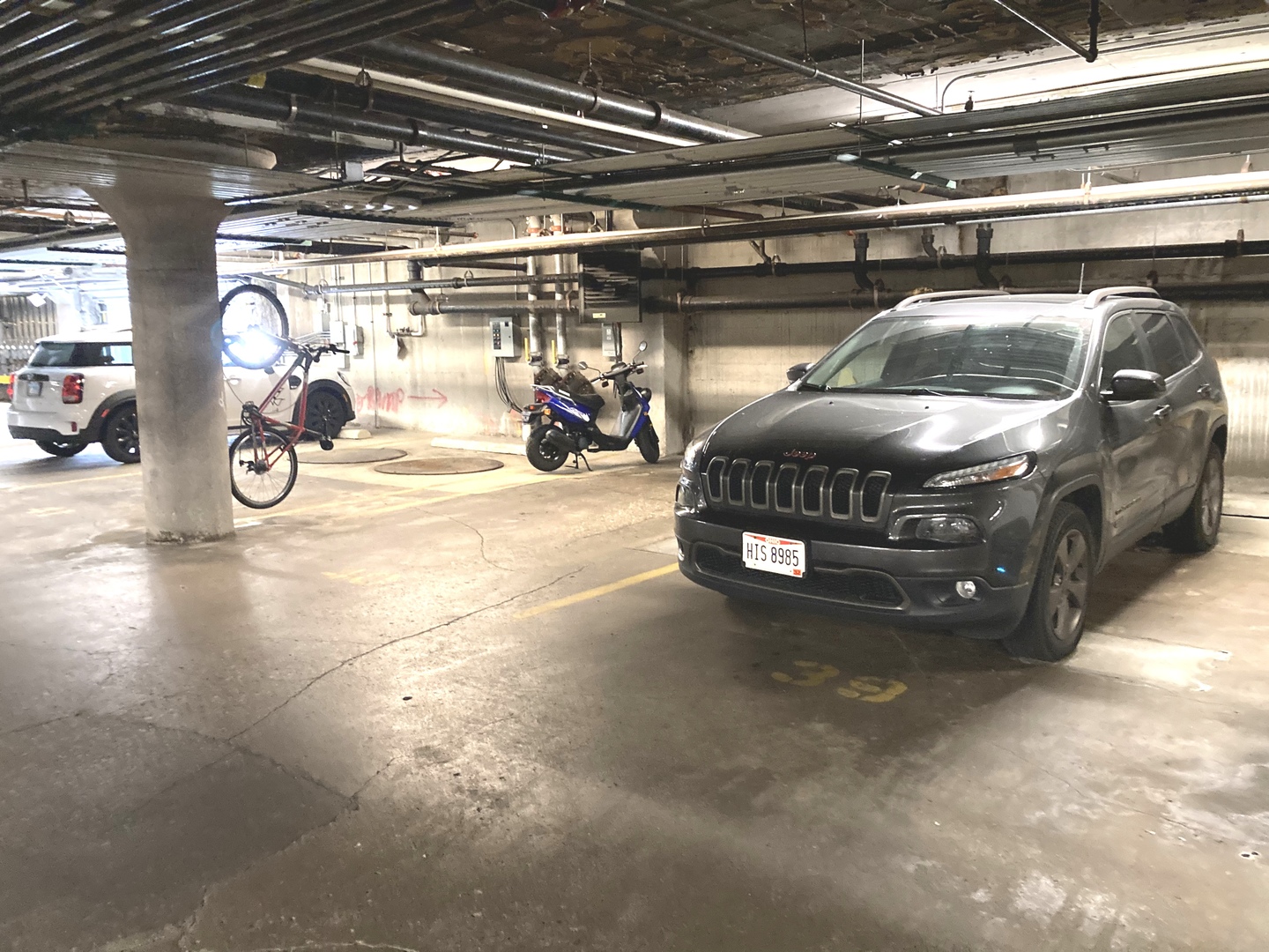 1111 West 15th Street, Unit 115 Chicago, IL 60608 - Photo 20 of 22 a car parked in garage