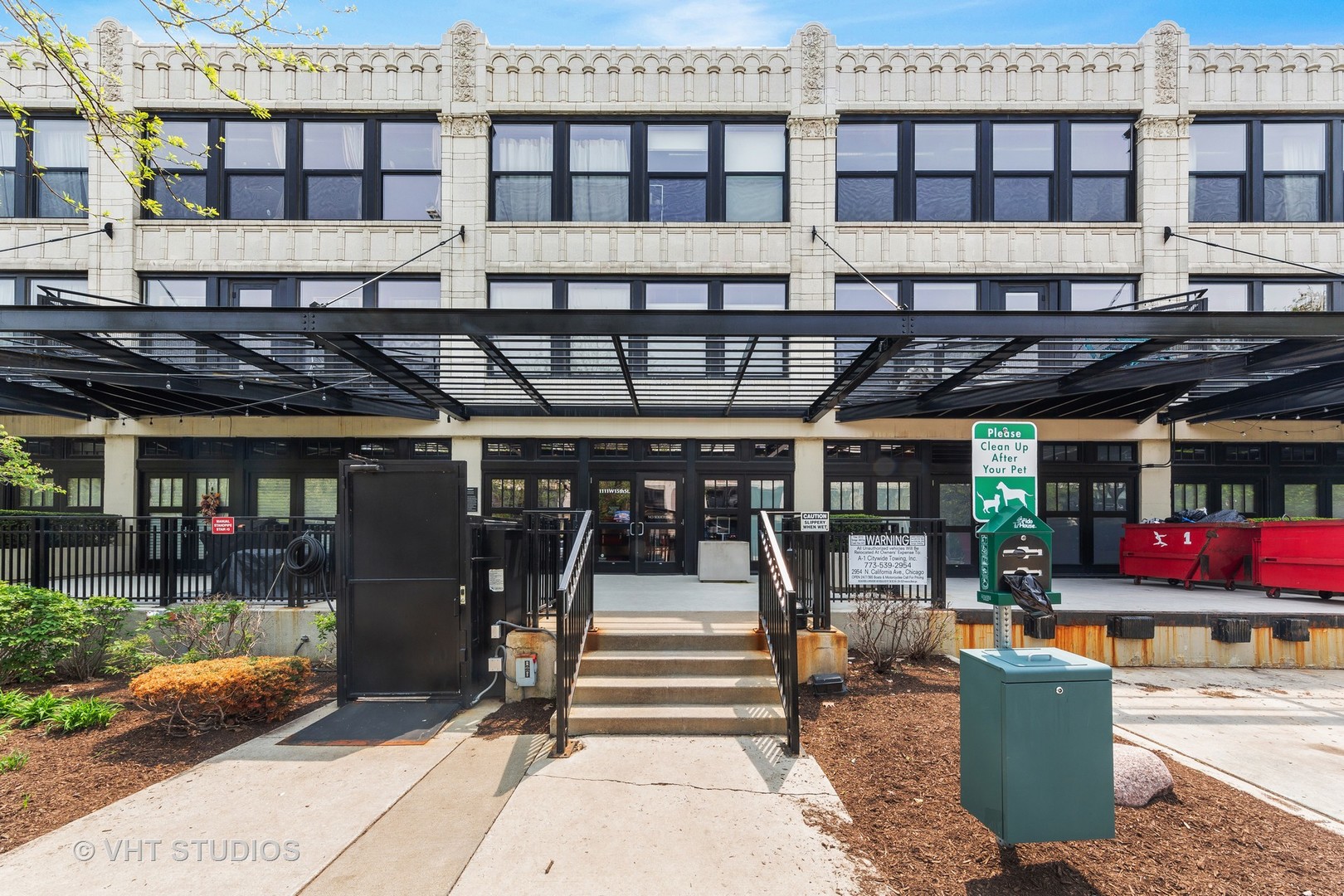 1111 West 15th Street, Unit 115 Chicago, IL 60608 - Photo 2 of 22 a view of a building with a outdoor space