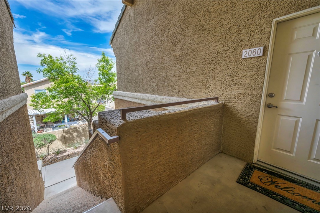 8070 West Russell Road, Unit 2060 Las Vegas, NV 89113 - Photo 31 of 47 This entry features a private porch leading to the entrance of the residence.