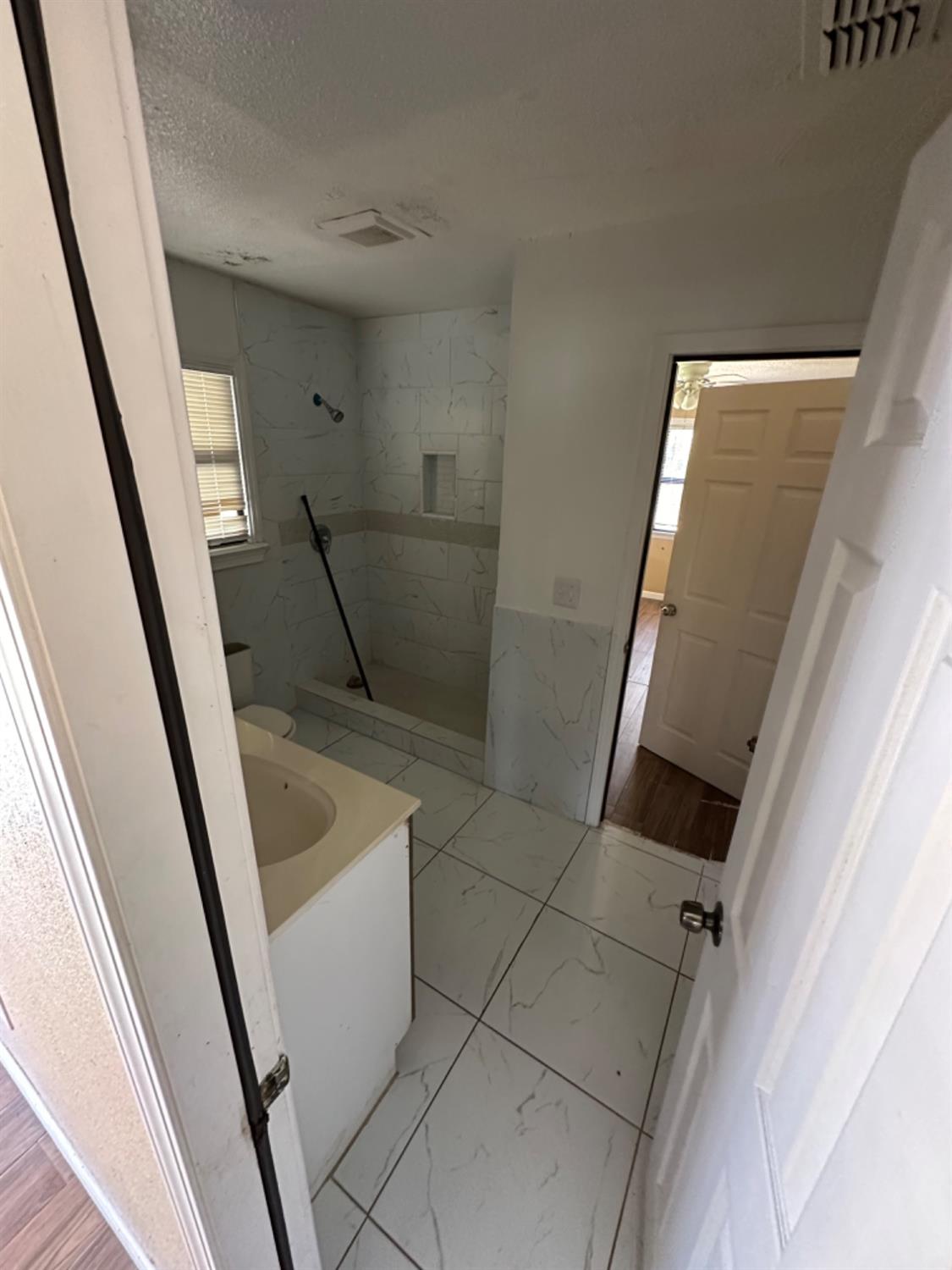 1474 Smith Road Yuba City, CA 95993 - Photo 9 of 12 a view of an entryway with staircase